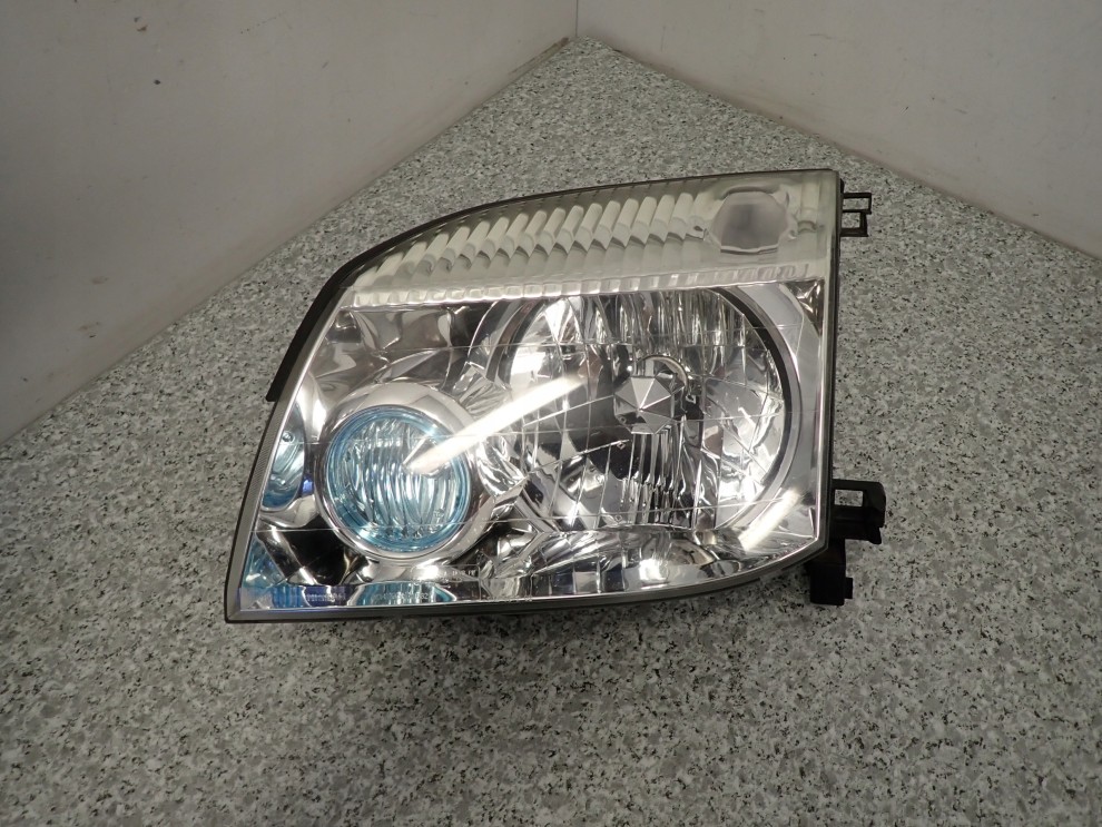 NISSAN XTRAIL T30 LAMPA PRZEDNIA LEWA REFLEKTOR EUROPA 6/8