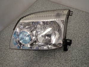 NISSAN XTRAIL T30 LAMPA PRZEDNIA LEWA REFLEKTOR EUROPA 2/8 MINIATURA