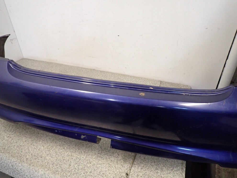 NISSAN ALMERA N16 00-03 ZDERZAK TYLNY BX1 9/15