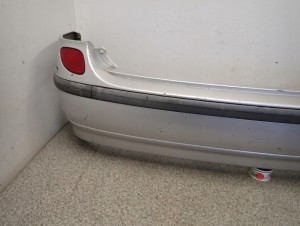 NISSAN ALMERA TINO 00-06 ZDERZAK TYLNY 7/15 MINIATURA