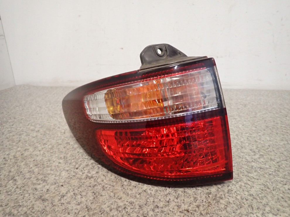 TOYOTA PREVIA 00-02 LAMPA TYLNA LEWA ZEWNĘTRZNA 2/8