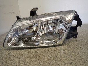 ALMERA N16 00 REFLEKTOR PRZEDNI LEWY LAMPA EUROPA