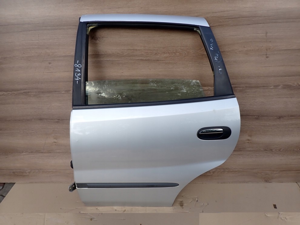 NISSAN ALMERA TINO DRZWI TYLNE LEWE KL0 1/8