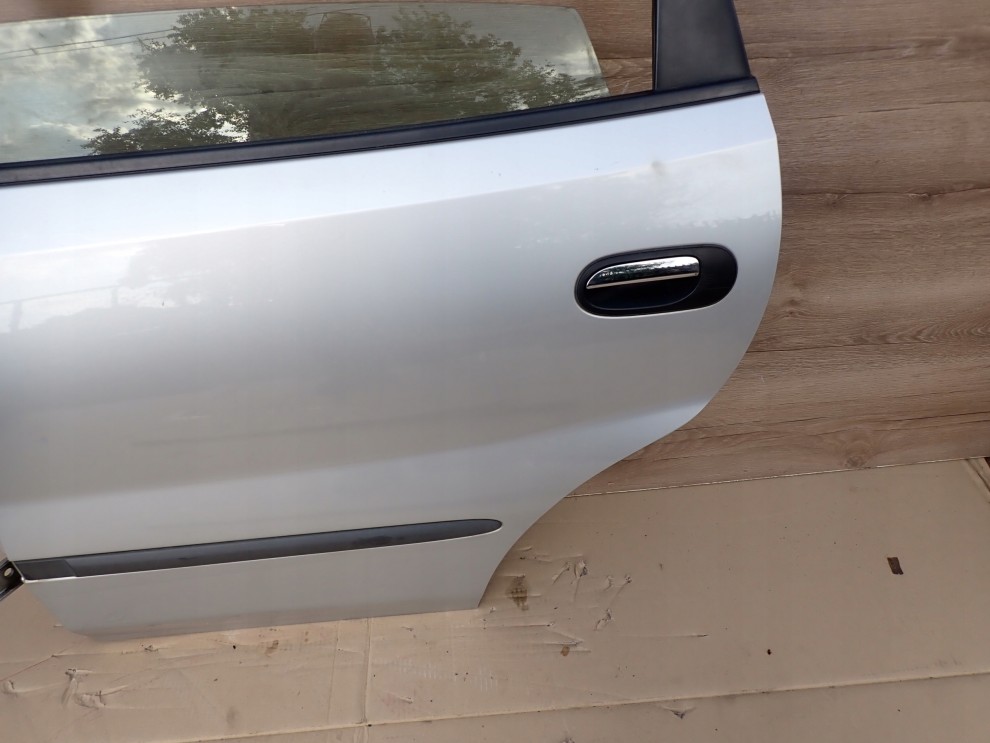 NISSAN ALMERA TINO DRZWI TYLNE LEWE KL0 5/8