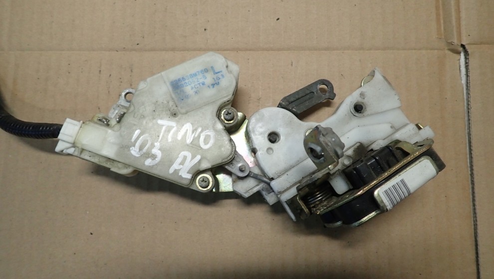 NISSAN ALMERA TINO 00-06 ZAMEK DRZWI TYLNY LEWY 1/4