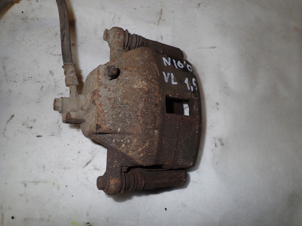 NISSAN ALMERA N16 00-06 ZACISK PRZEDNI LEWY 4/6