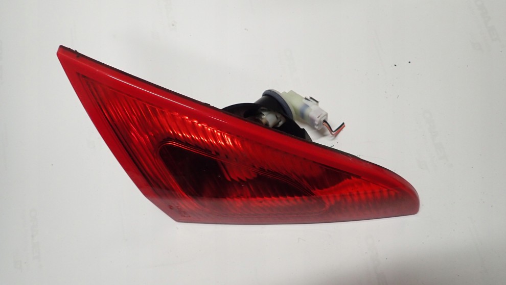 MITSUBISHI COLT 3d 04-09 LAMPA TYLNA LEWA W KLAPĘ 3/4