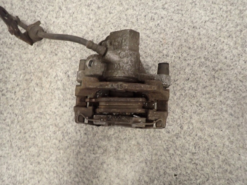 MAZDA5 5 05-10 ZACISK HAMULCOWY TYLNY LEWY 4/6