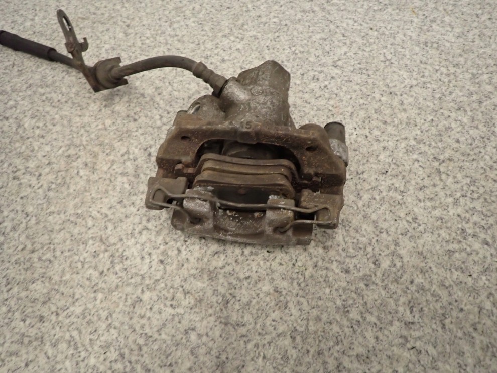 MAZDA5 5 05-10 ZACISK HAMULCOWY TYLNY LEWY 5/6
