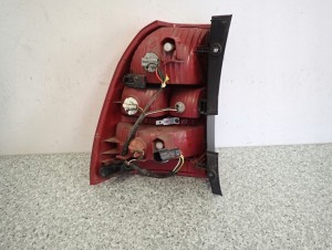 KIA SPORTAGE II 04-08 LAMPA TYLNA LEWA EUROPA 6/8 MINIATURA