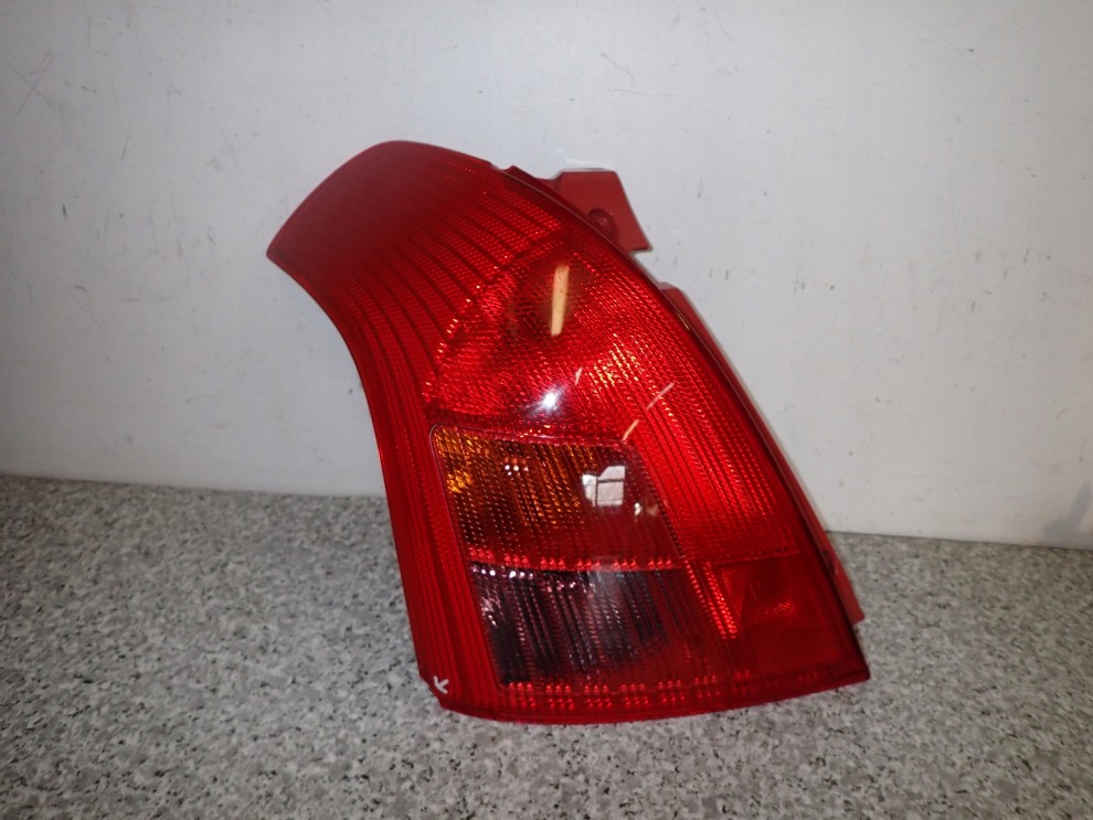 SUZUKI SWIFT MK 04-07 LAMPA TYLNA LEWA TYŁ 1/10