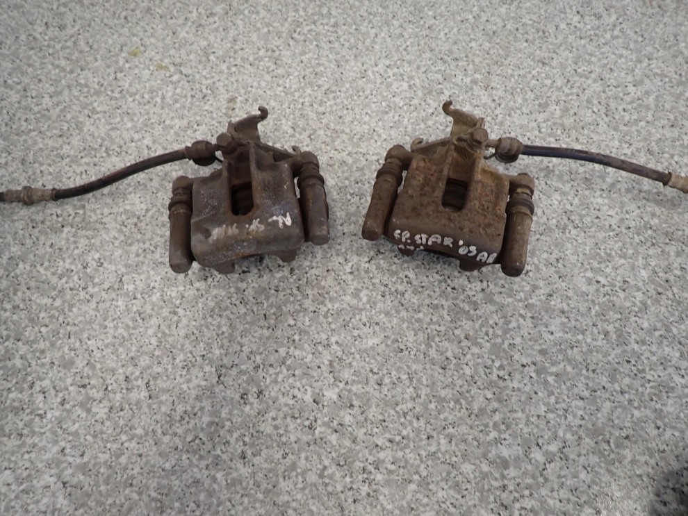 MITSUBISHI SPACE STAR99-05 CARISMA 96-03 ZACISK TYLNY LEWY LUB PRAWY 1/6