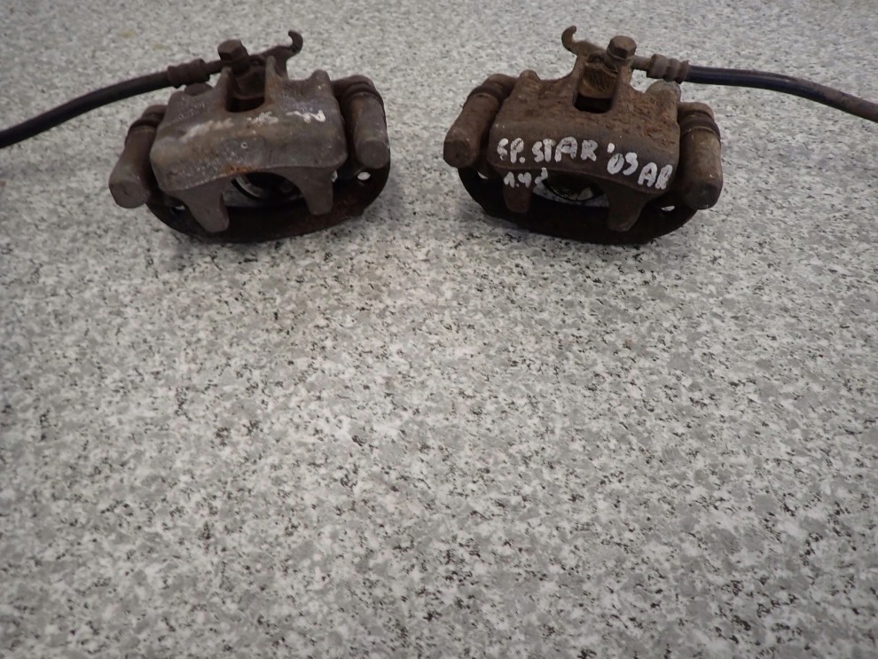 MITSUBISHI SPACE STAR99-05 CARISMA 96-03 ZACISK TYLNY LEWY LUB PRAWY 3/6