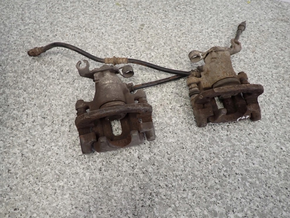 MITSUBISHI SPACE STAR99-05 CARISMA 96-03 ZACISK TYLNY LEWY LUB PRAWY 6/6