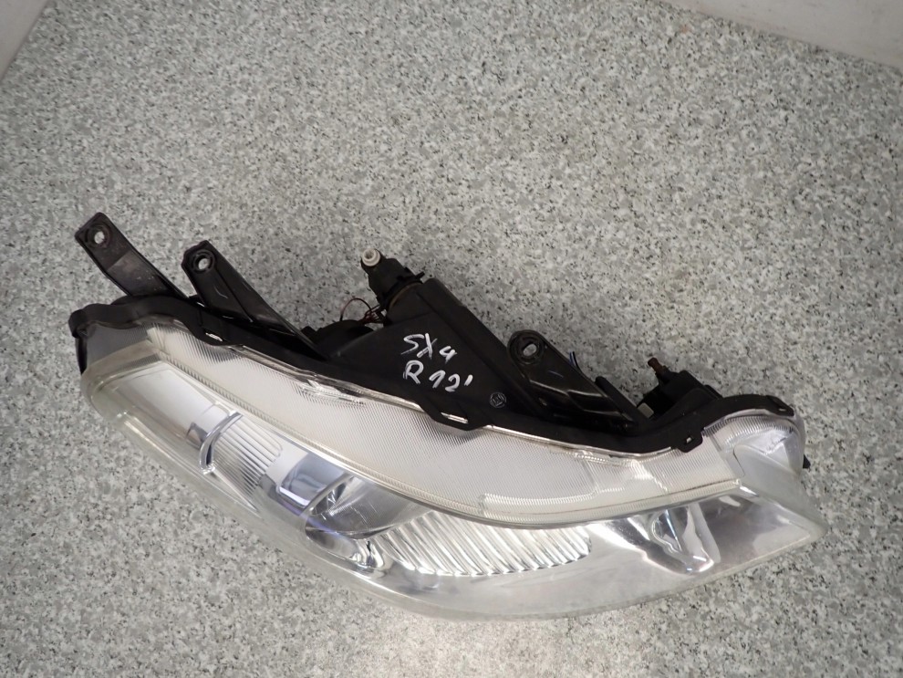 SUZUKI SX4 FIAT SEDICI 06-13 LAMPA PRZEDNIA PRAWA REFLEKTOR 6/9