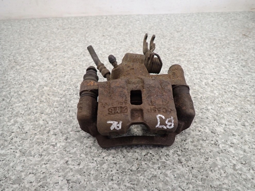 MAZDA 323 BJ F 98-02 ZACISK HAMULCOWY TYLNY LEWY 1/4