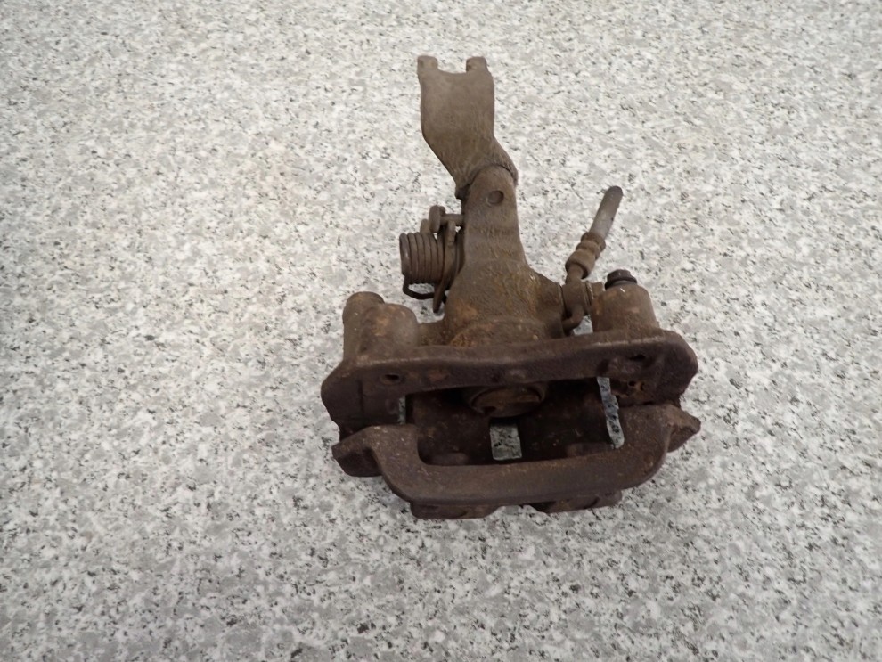 MAZDA 323 BJ F 98-02 ZACISK HAMULCOWY TYLNY LEWY 3/4