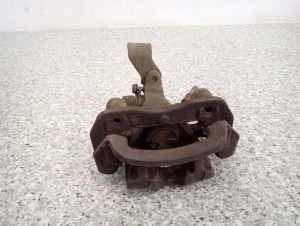MAZDA 323 BJ F 98-02 ZACISK HAMULCOWY TYLNY LEWY 4/4 MINIATURA
