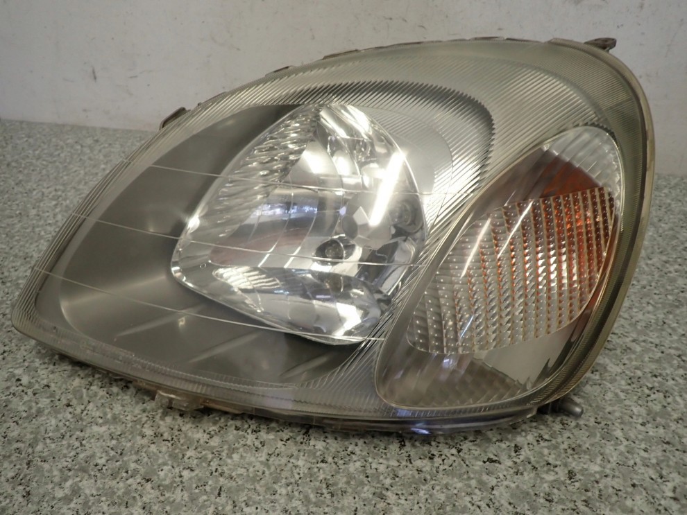 TOYOTA YARIS JT 99- LAMPA PRZEDNIA LEWA REFLEKTOR 4/5