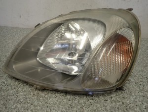 TOYOTA YARIS JT 99- LAMPA PRZEDNIA LEWA REFLEKTOR 4/5 MINIATURA