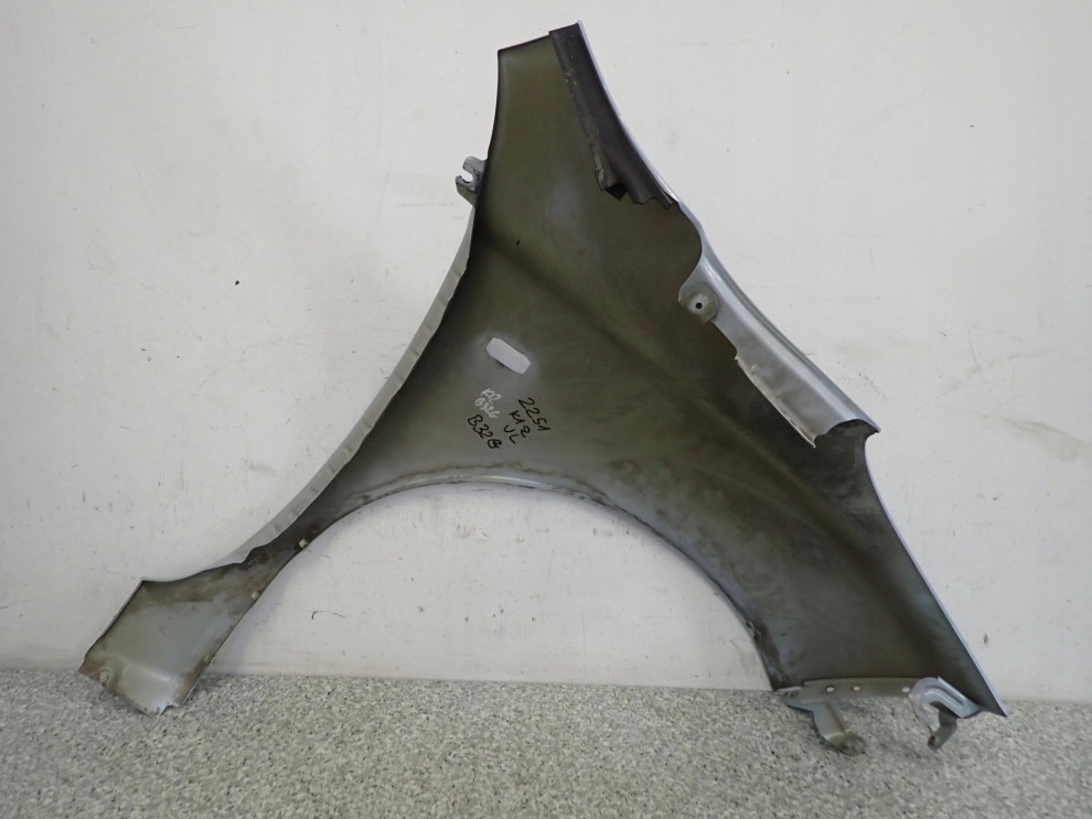 NISSAN MICRA K12 03-09 BŁOTNIK PRZEDNI LEWY B32G 12/12