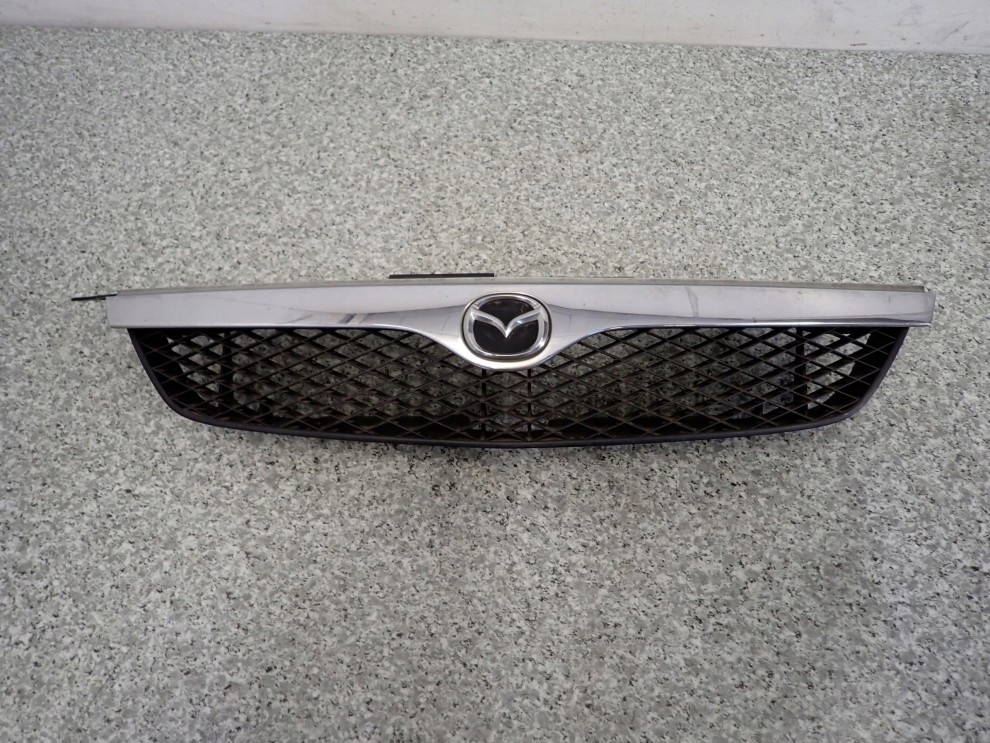 MAZDA 323 BJ 97-00 ATRAPA GRILL ORYGINALNA 1/8