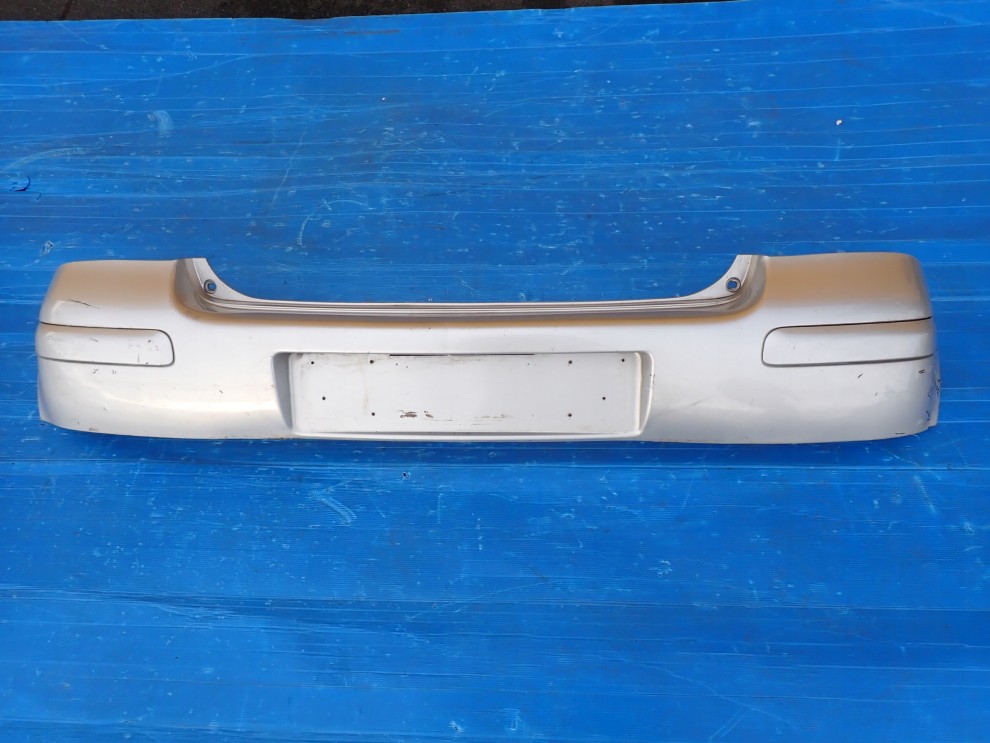 TOYOTA YARIS I FR 03-05 ZDERZAK TYLNY TYŁ 1E7 USZKODZONY 2/11