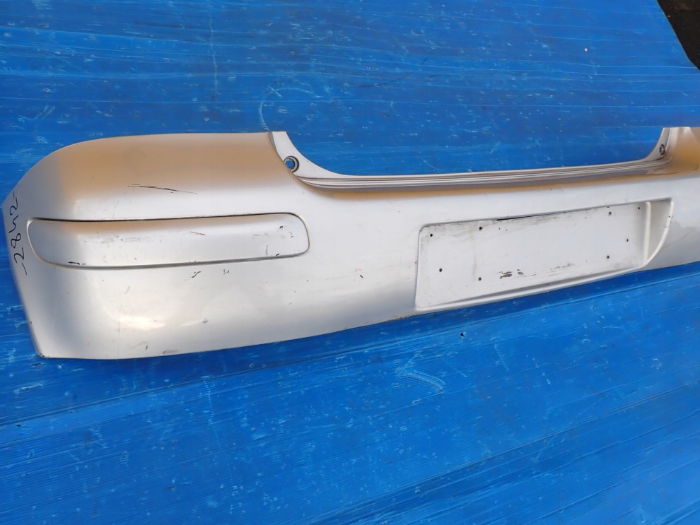 TOYOTA YARIS I FR 03-05 ZDERZAK TYLNY TYŁ 1E7 USZKODZONY 4/11