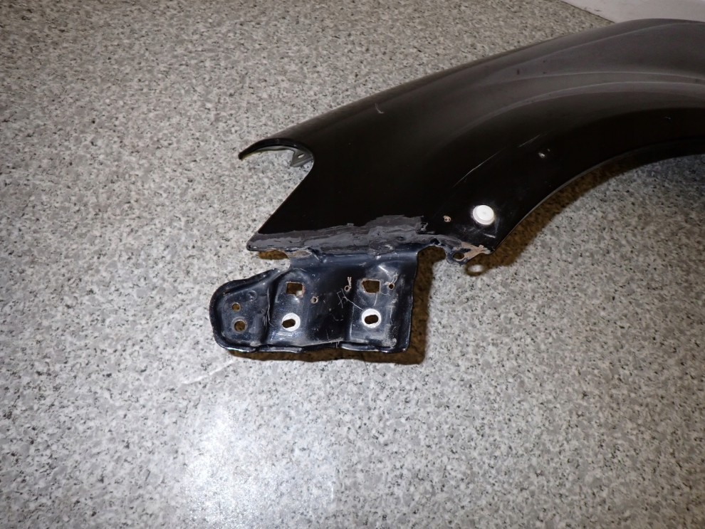 SUZUKI SX4 06-12 BŁOTNIK PRZEDNI LEWY ZCE 6/10