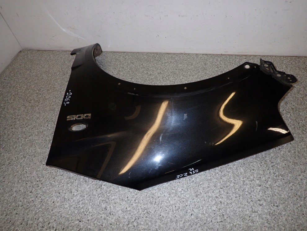 SUZUKI SX4 06-12 BŁOTNIK PRZEDNI LEWY ZCE 7/10