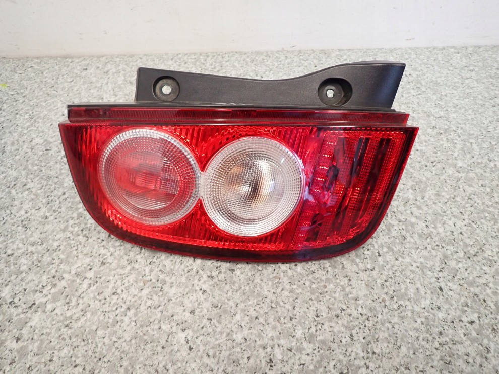 NISSAN MICRA K12 CC CABRIO 03- LAMPA TYLNA LEWA 5/9