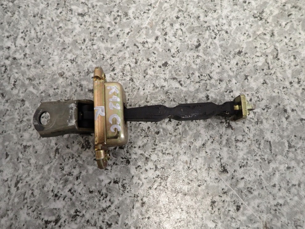 NISSAN MICRA K12 CC 03- OGRANICZNIK DRZWI PRAWY 1/2