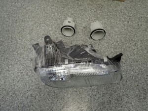 MAZDA 323 BA F 94-98 LAMPA PRZEDNIA PRAWA REFLEKTOR 5/8 MINIATURA