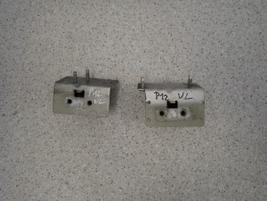 NISSAN PRIMERA P12 02-07 WSPORNIK ZDERZAKA PRZÓD LEWY I PRAWY 1/8 MINIATURA