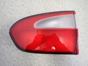 HYUNDAI H1 H200 98- LAMPA TYLNA PRAWA WEWNĘTRZNA NOWY ORYGINAŁ 1/4 MINIATURA