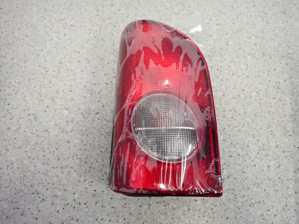 HYUNDAI H100 96-00 LAMPA TYLNA LEWA NOWA ORYGINAŁ 1/5