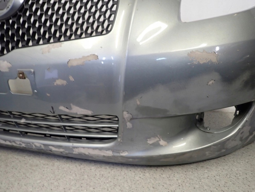 TOYOTA YARIS II 06-09 ZDERZAK PRZEDNI 5/16