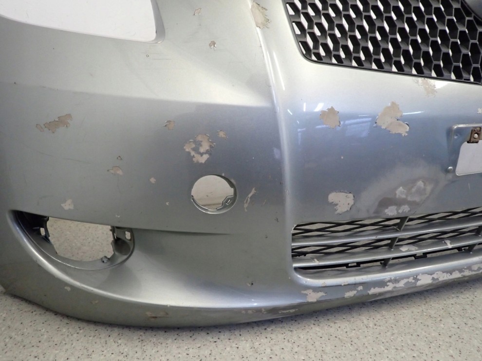 TOYOTA YARIS II 06-09 ZDERZAK PRZEDNI 7/16