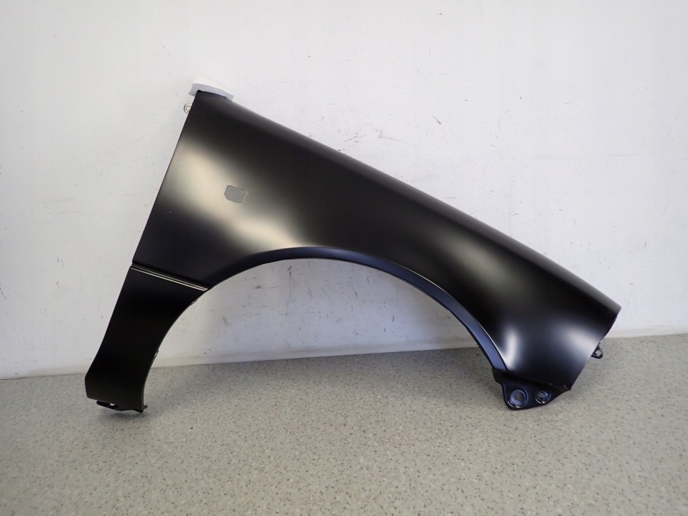 SUZUKI SWIFT 89-96 BŁOTNIK PRZEDNI PRAWY NOWY 1/5