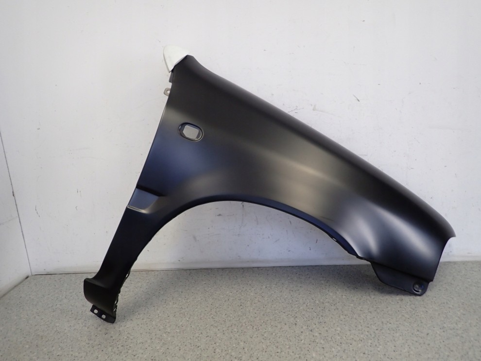 SUZUKI ALTO 96-00 BŁOTNIK PRZEDNI PRAWY NOWY 1/4