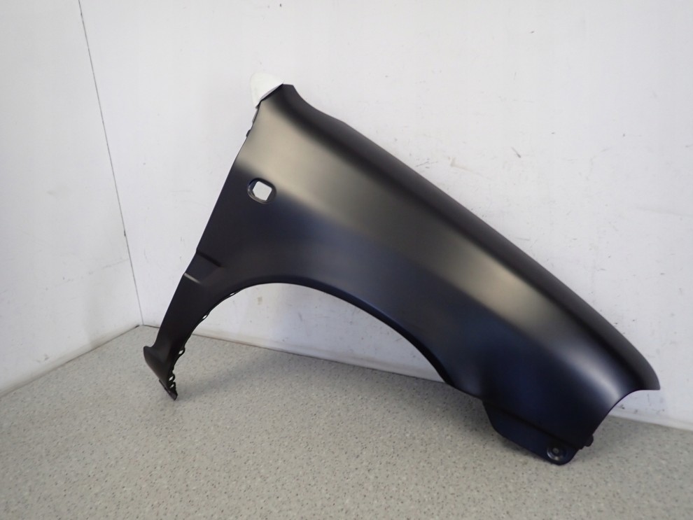 SUZUKI ALTO 96-00 BŁOTNIK PRZEDNI PRAWY NOWY 2/4