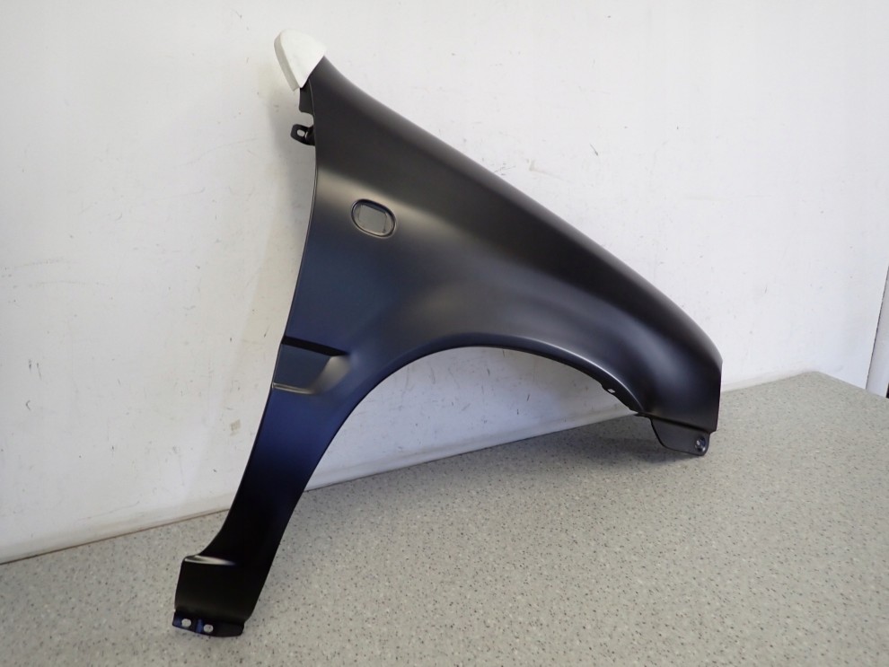 SUZUKI ALTO 96-00 BŁOTNIK PRZEDNI PRAWY NOWY 3/4