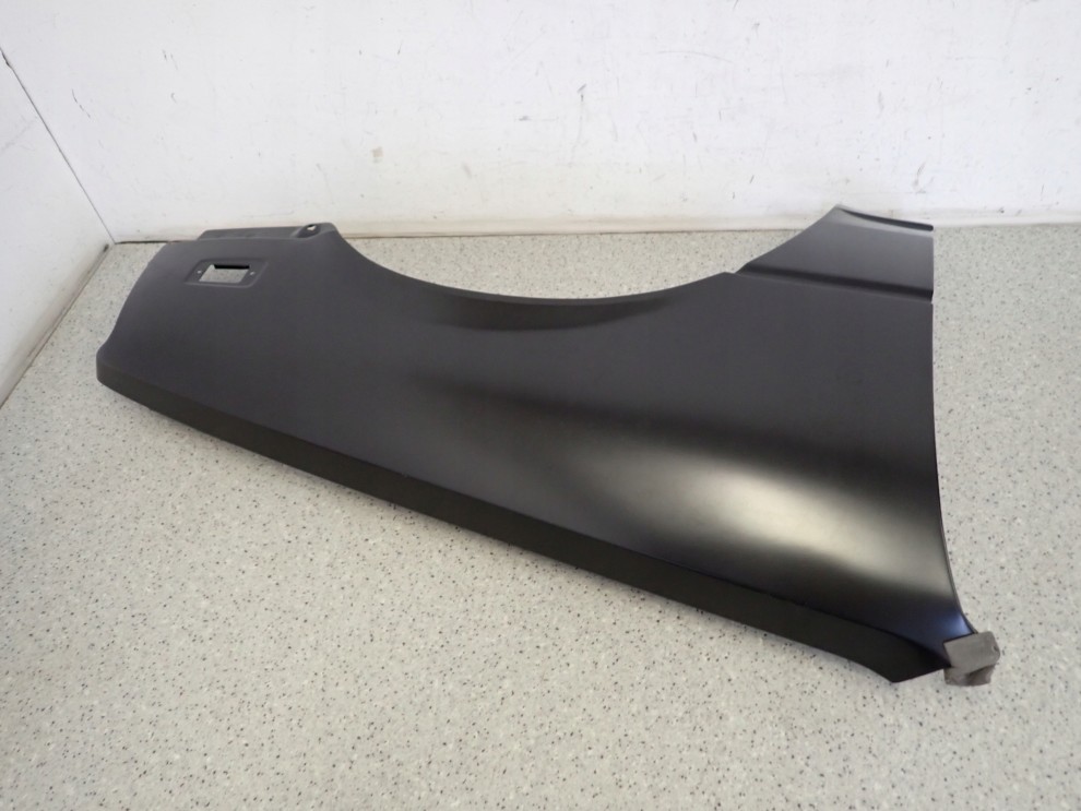 SUZUKI SWIFT 87-89 BŁOTNIK PRZEDNI PRAWY NOWY 4/5