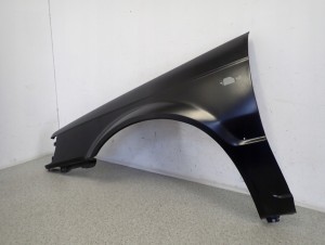 MAZDA 323 BF 85-87 BŁOTNIK PRZEDNI LEWY 3/5 MINIATURA