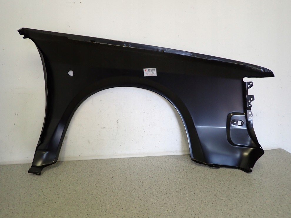 NISSAN CHERRY N12 1982-1986 BŁOTNIK PRZEDNI LEWY 9/11