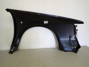 NISSAN CHERRY N12 1982-1986 BŁOTNIK PRZEDNI LEWY 9/11 MINIATURA