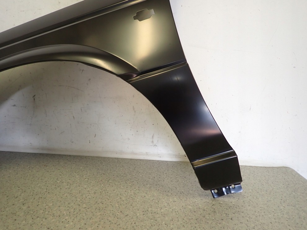 NISSAN SUNNY B12 KOMBI SEDAN 86-88 BŁOTNIK PRZEDNI LEWY NOWY 3/10