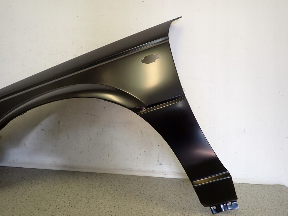 NISSAN SUNNY B12 KOMBI SEDAN 86-88 BŁOTNIK PRZEDNI LEWY NOWY 4/10