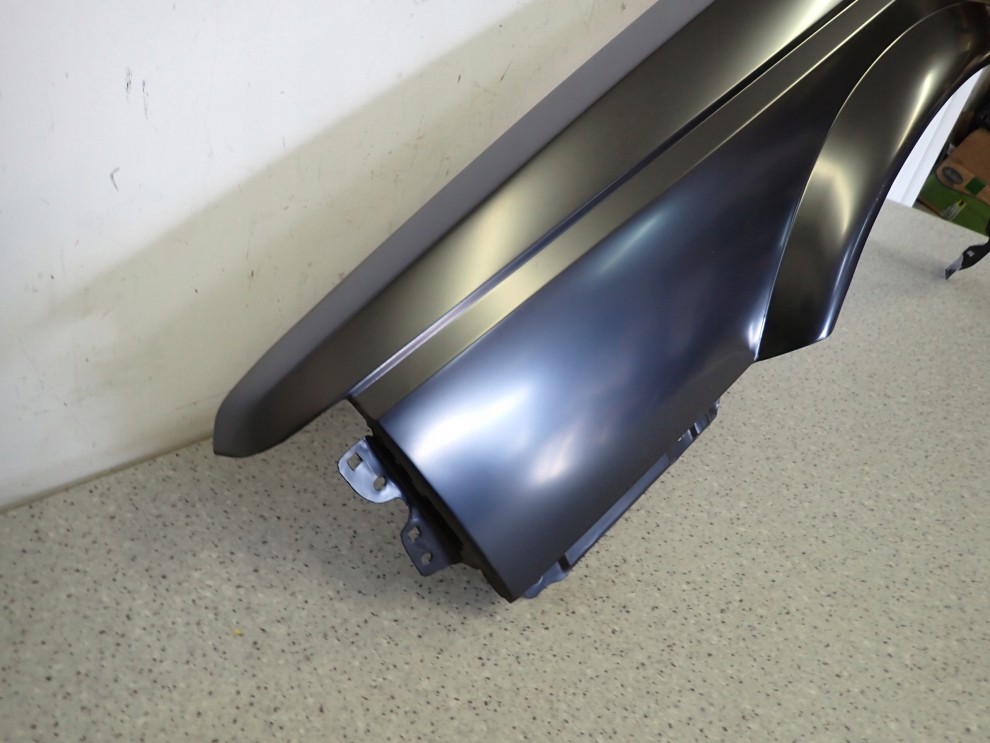 NISSAN SUNNY B12 KOMBI SEDAN 86-88 BŁOTNIK PRZEDNI LEWY NOWY 8/10