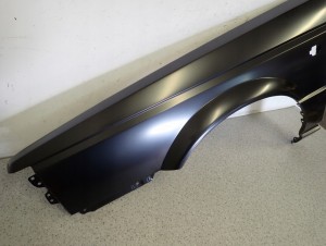 NISSAN SUNNY B12 KOMBI SEDAN 86-88 BŁOTNIK PRZEDNI LEWY NOWY 6/10 MINIATURA